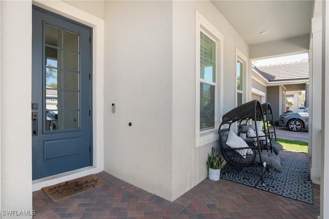 property entrance featuring covered porch