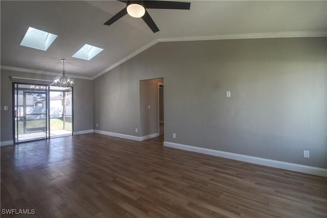 empty room with lofted ceiling with skylight, crown molding, dark wood-type flooring, and ceiling fan with notable chandelier