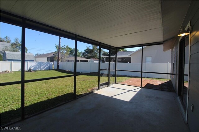 unfurnished sunroom with a healthy amount of sunlight