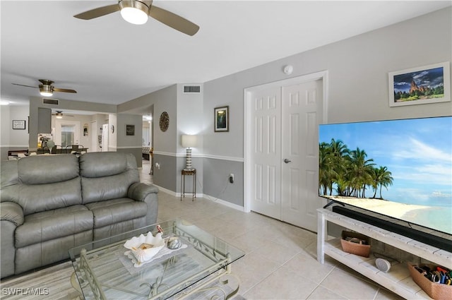 living room featuring light tile patterned flooring