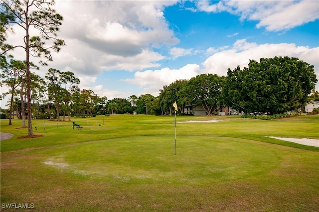 view of home's community featuring a yard