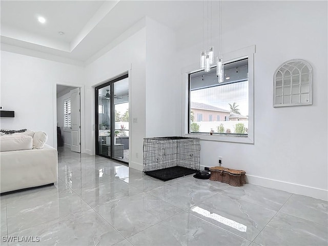 living room featuring a high ceiling