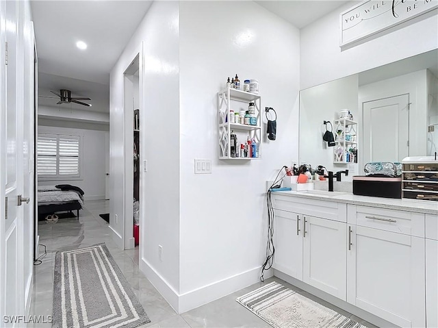 bathroom with vanity and ceiling fan