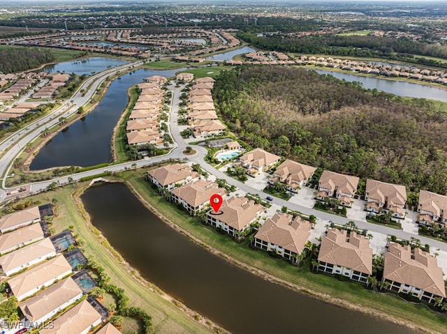 drone / aerial view with a water view