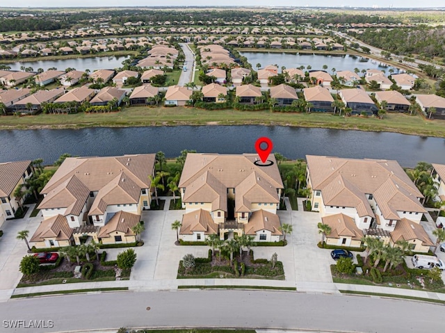 drone / aerial view with a water view