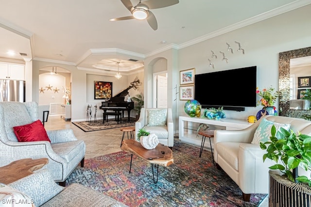 living room featuring ceiling fan, ornamental molding, and light tile patterned flooring