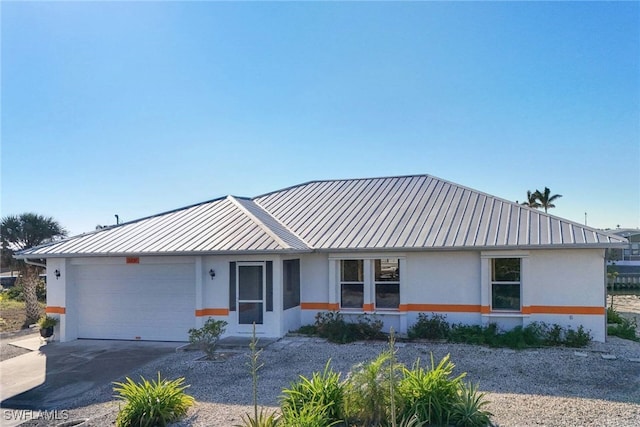 single story home featuring a garage