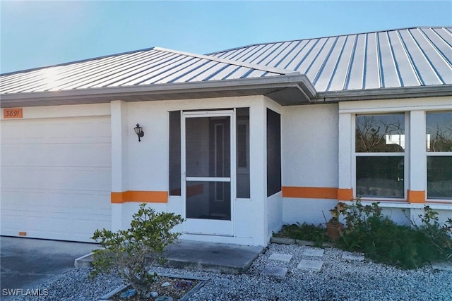 property entrance featuring a garage