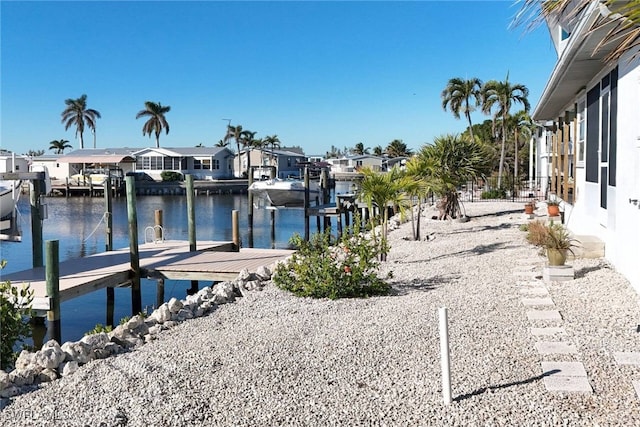 dock area with a water view