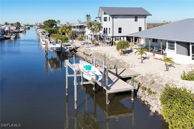 dock area featuring a water view