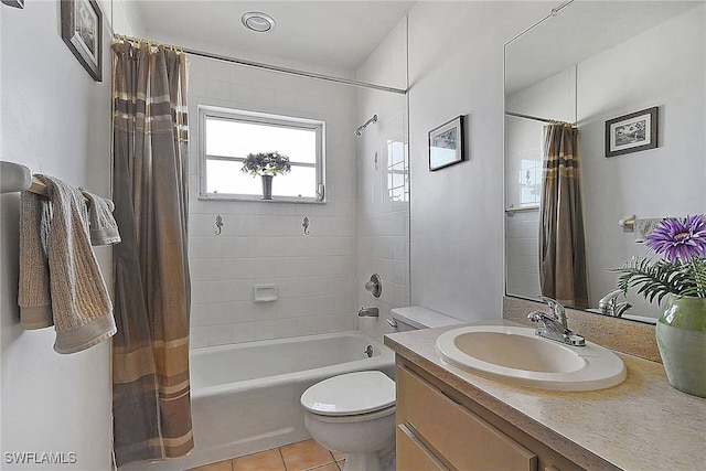 full bathroom with tile patterned floors, shower / bath combination with curtain, toilet, and vanity