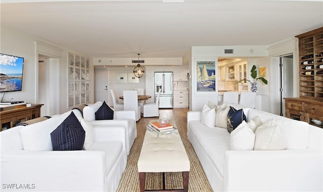 living room with hardwood / wood-style floors