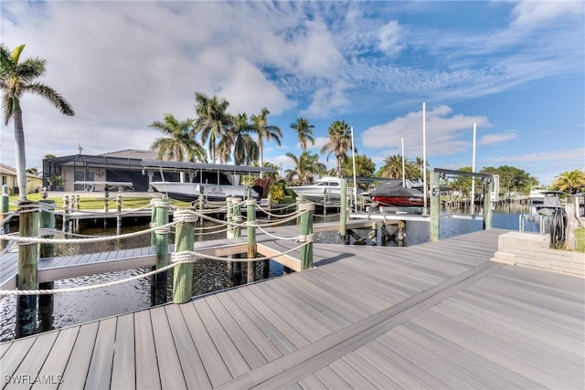 view of dock with a water view