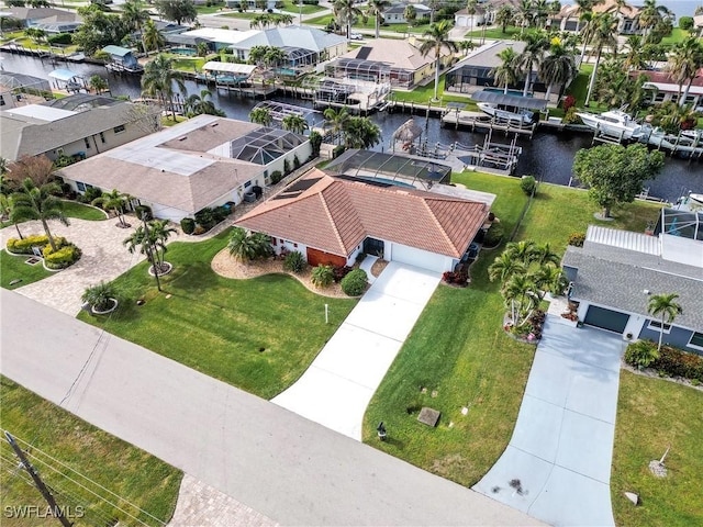 birds eye view of property featuring a water view