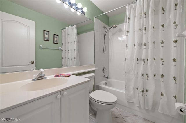 full bathroom featuring shower / bath combo with shower curtain, tile patterned floors, vanity, and toilet