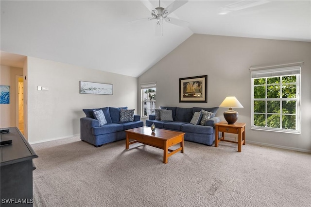 carpeted living room featuring vaulted ceiling and ceiling fan