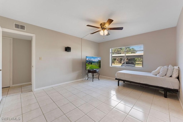 bedroom with light tile patterned flooring and ceiling fan