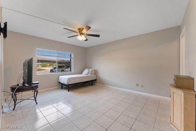 bedroom featuring light tile patterned flooring and ceiling fan