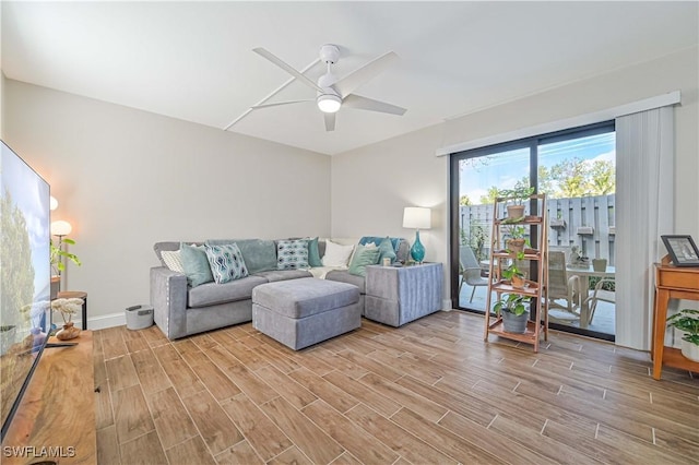 living room featuring ceiling fan