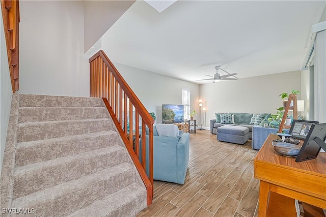 living room featuring ceiling fan