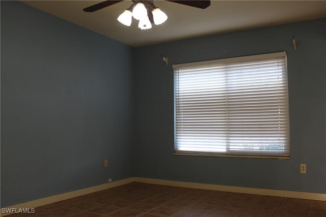 empty room featuring ceiling fan