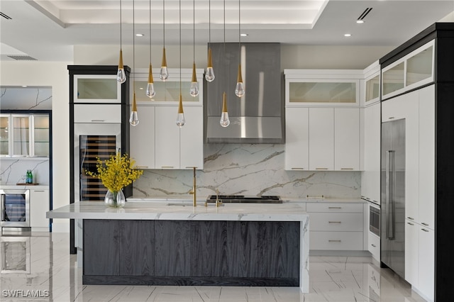 kitchen featuring modern cabinets, wine cooler, marble finish floor, ventilation hood, and white cabinetry