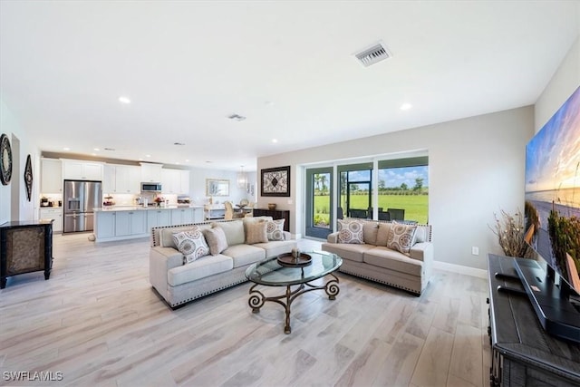 living room featuring light hardwood / wood-style flooring