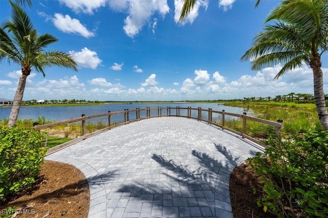 view of patio / terrace with a water view