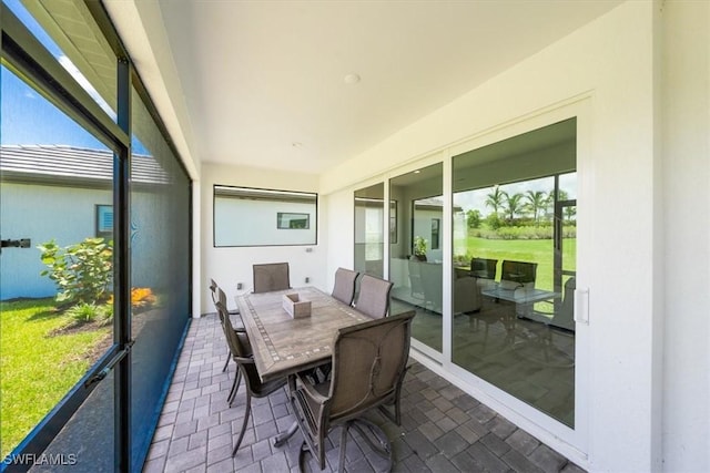 4016 Pegasus Way, Naples, FL 34120 - sunroom / solarium featuring outdoor dining area