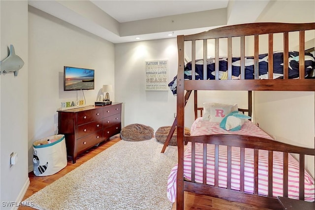 bedroom with wood-type flooring