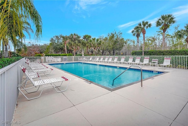 view of swimming pool featuring a patio area