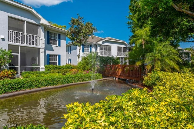 view of property's community with a water view