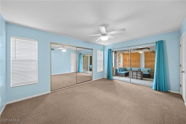 unfurnished bedroom featuring ceiling fan, light colored carpet, and a closet