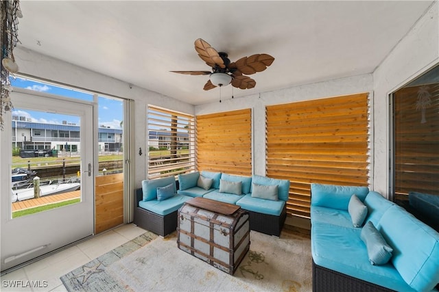 sunroom / solarium with ceiling fan