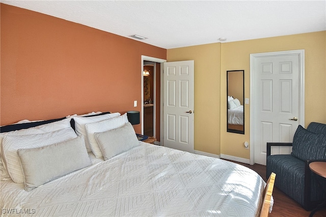 bedroom featuring hardwood / wood-style floors