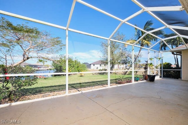 view of patio / terrace featuring a lanai