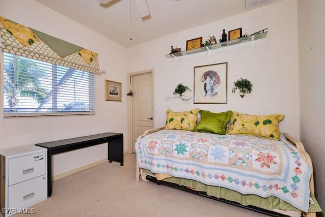 carpeted bedroom featuring ceiling fan