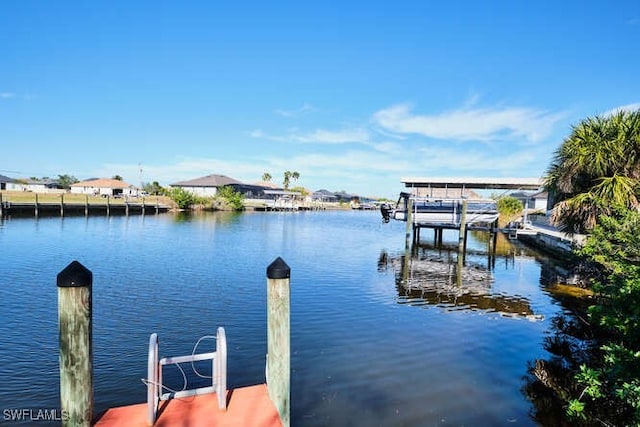 dock area featuring a water view