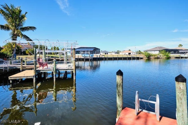 dock area with a water view