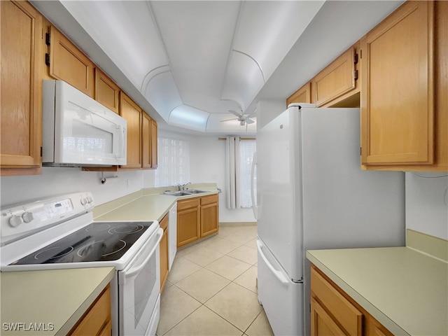 kitchen with ceiling fan, sink, light tile patterned floors, and white appliances