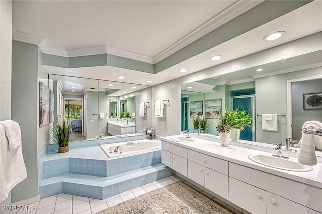 bathroom featuring crown molding, tile patterned floors, independent shower and bath, and vanity