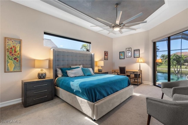 carpeted bedroom with multiple windows, ceiling fan, and access to outside