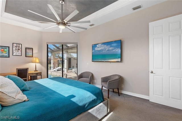 bedroom with access to outside, ornamental molding, ceiling fan, carpet floors, and a tray ceiling