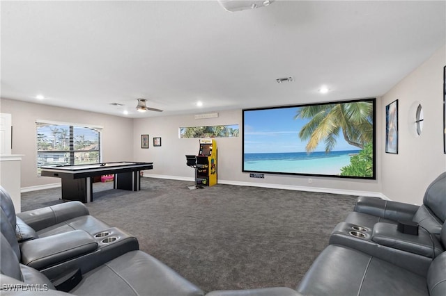 carpeted cinema with ceiling fan and billiards