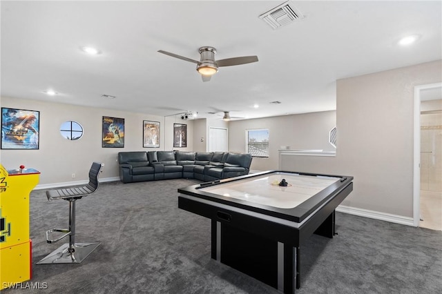 rec room with dark carpet and ceiling fan