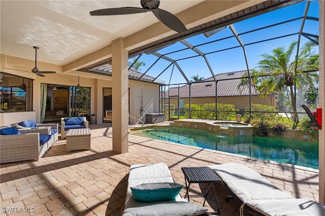 view of swimming pool with a lanai, ceiling fan, an in ground hot tub, and outdoor lounge area