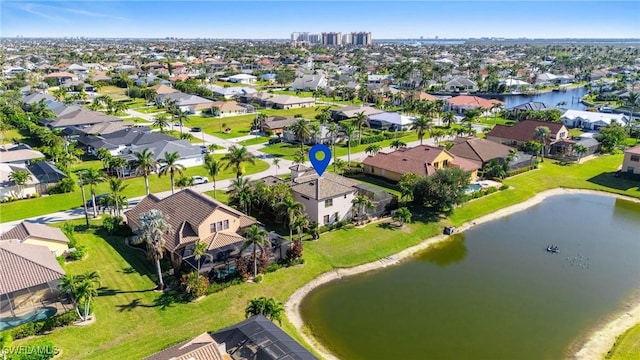 bird's eye view with a water view