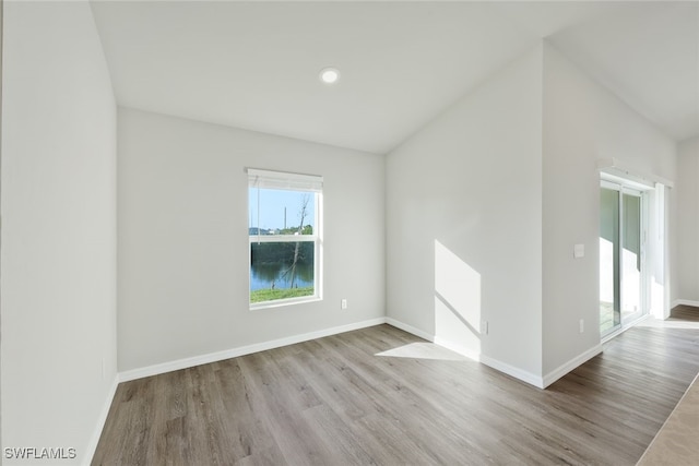 empty room with light hardwood / wood-style floors