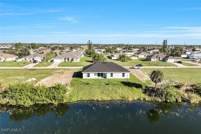 drone / aerial view featuring a water view