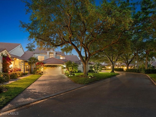 view of front of property with a garage